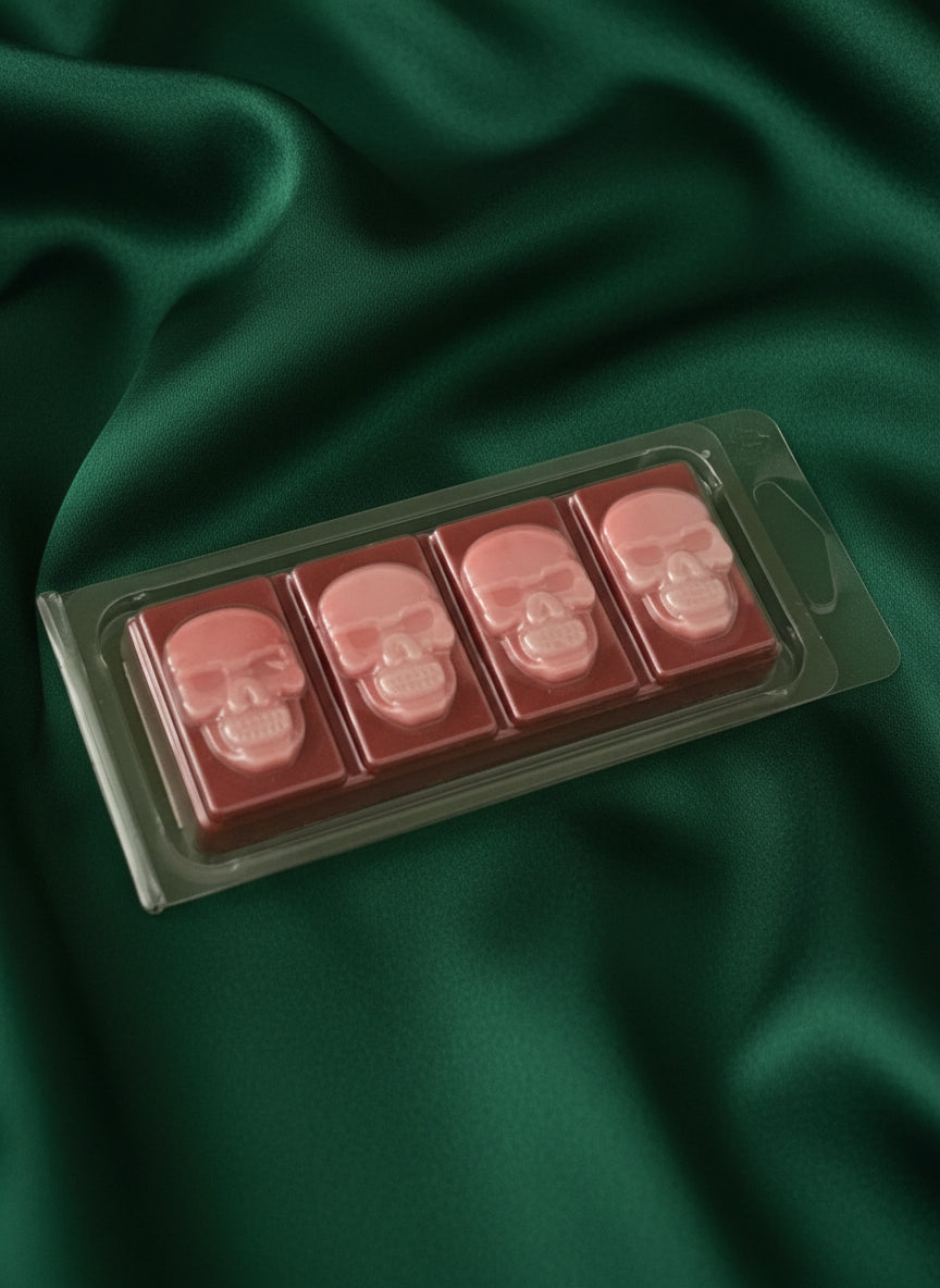 Pack of wax melts on a green background